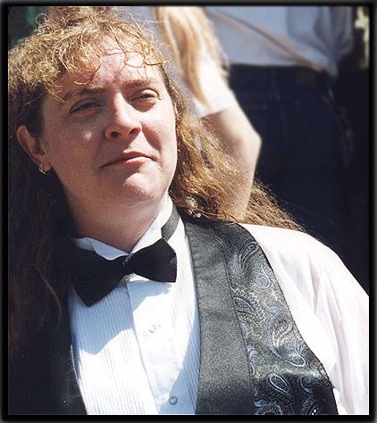 Mel at her wedding, on the steps of the Racine UU Church.  Photo copyright 2001 Trace DeHaven