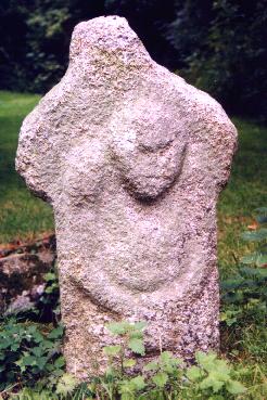 Stepaside Sheela, Co. Dublin,  Ireland.   This Sheela may be guarding the entrance to a crypt.  photo copyright 2000 Tara McLoughlin. **Click for more information**